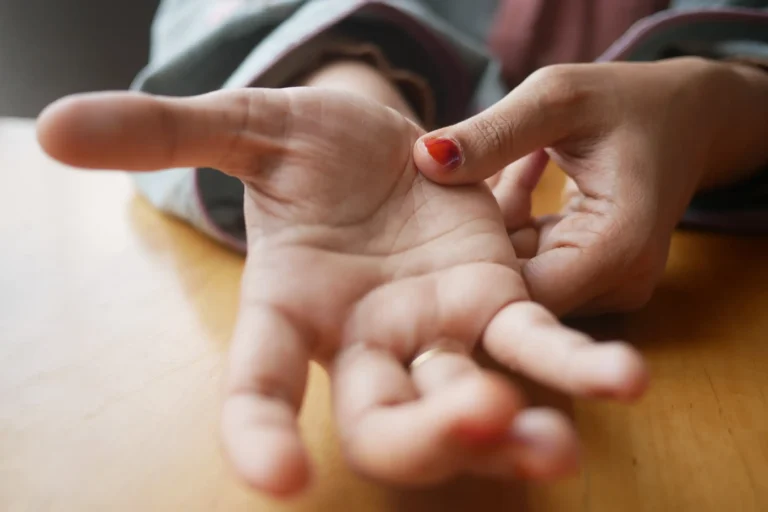 A woman's open hand ready to be read by a fortune teller.