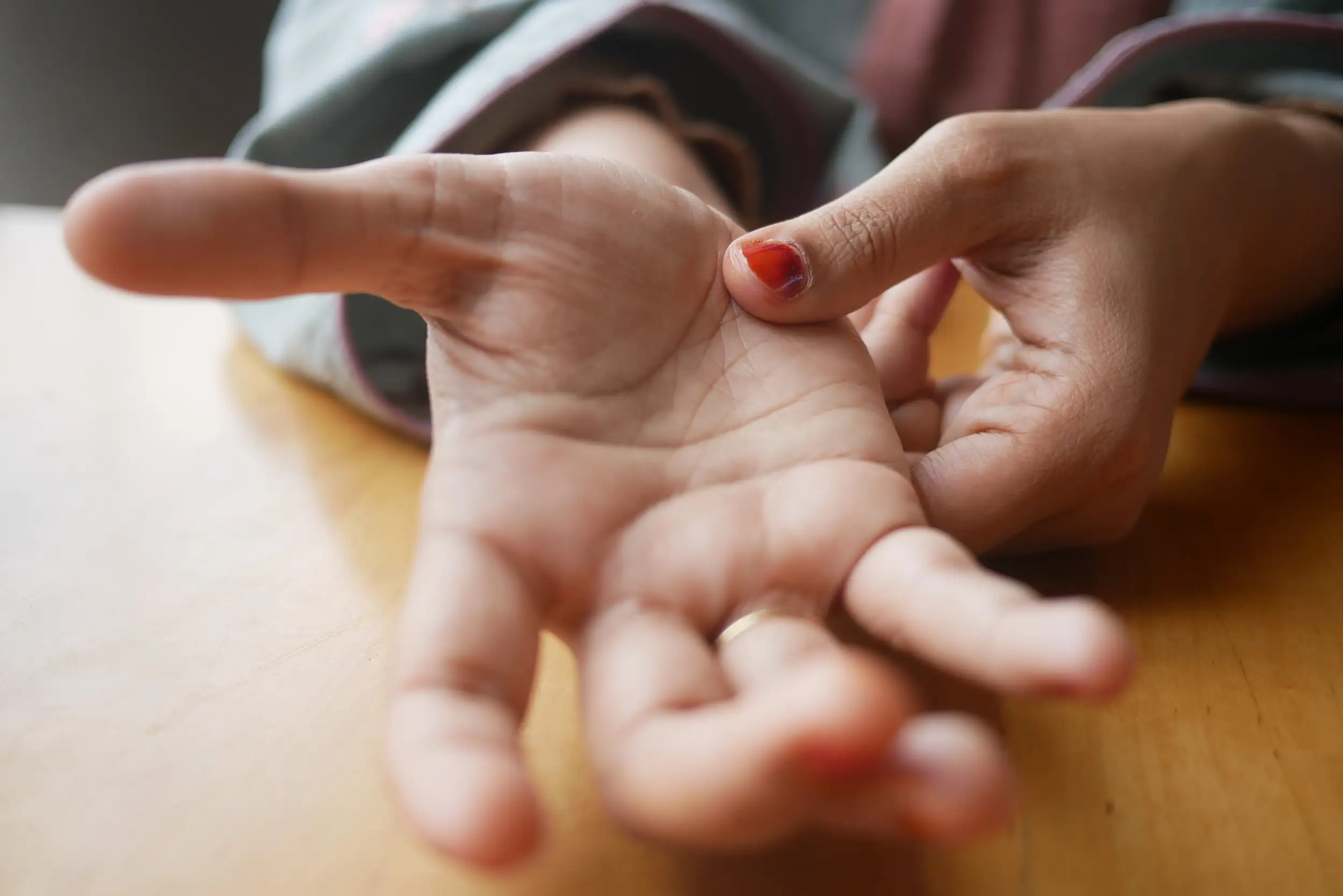 A woman's open hand ready to be read by a fortune teller.